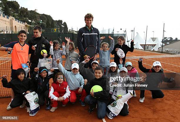 Tomas Berdych of Czech Republic with kids after a coaching clinic during previews for the ATP Masters Series Monte Carlo Tennis on April 11, 2010 in...