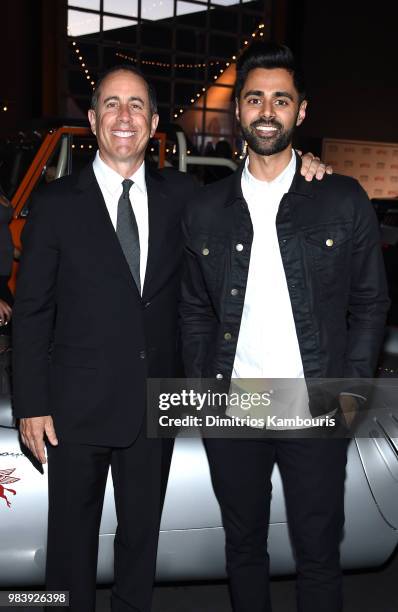 Comedians Jerry Seinfeld and Hasan Minhaj attend Comedians in Cars Getting Coffee - New York Event at Classic Car Club Manhattan on June 25, 2018 in...