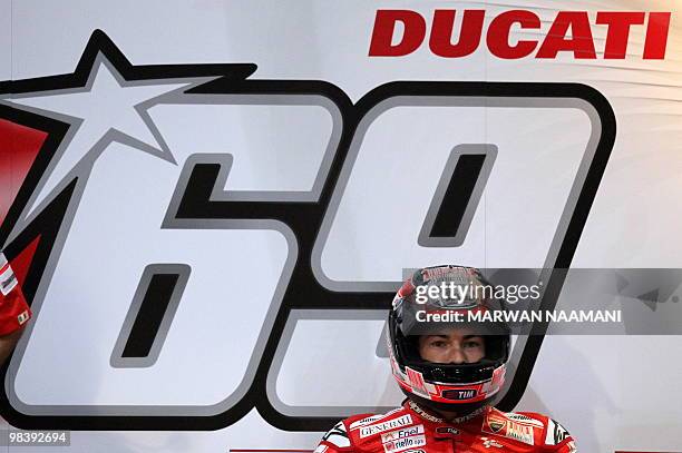 Nicky Hayden of Ducati Marlboro Team relaxes in preparation for a warm up drive prior the 2010 MotoGP final at the Losail International Circuit in...