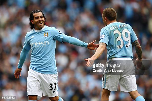 Carlos Tevez of Manchester City and Craig Bellamy smile during the Barclays Premier League match between Manchester City and Birmingham City at...