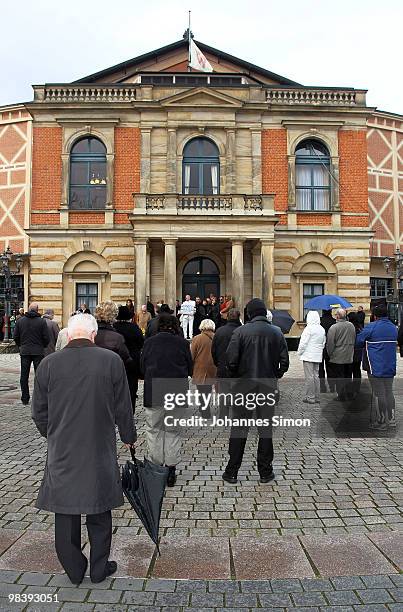 Villagers of Bayreuth attend the funeral service for Wolfgang Wagner outside the festival opera house on April 11, 2010 in Bayreuth, Germany....