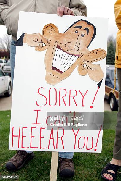 Several thousand people attend a Tea Party Express rally April 11, 2010 in Clinton Township, Michigan. The Tea Party Express members are on a...