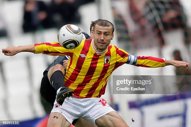 Jambulad Bazayev of FC Alania Vladikavkaz fights for the ball with Milos Krasic of PFC CSKA Moscow during the Russian Football League Championship...