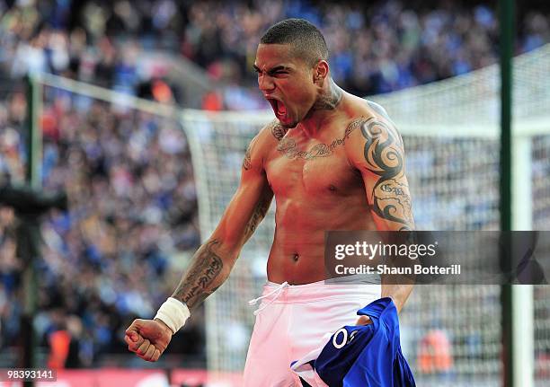 Kevin-Prince Boateng of Portsmouth takes off his shirt and celebrates his goal during the FA Cup sponsored by E.ON Semi Final match between Tottenham...