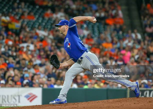 Toronto Blue Jays starting pitcher J.A. Happ prepares to throw a pitch during the baseball game between the Toronto Blue Jays and Houston Astros on...