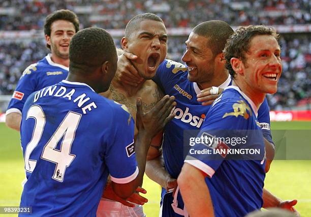 Portsmouth's Ghanaian player Kevin Prince Boateng celebrates scoring his penalty, Portsmouth's second goal during extra-time in the FA Cup semi-final...