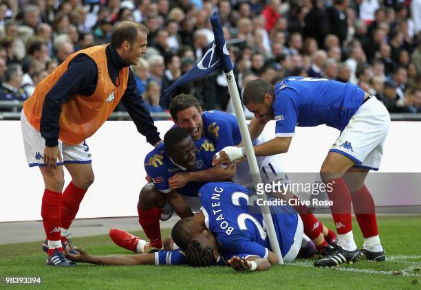 Portsmouth team members celebrate the game's first goal by Frederic Piquionne of Portsmouth during by the FA Cup sponsored by E.ON Semi Final match...