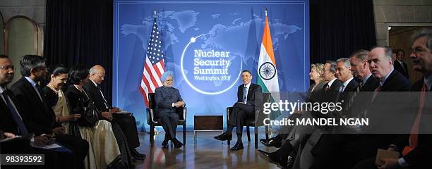 President Barack Obama takes part in a bilateral meeting with Indian Prime Minister Manmohan Singh at Blair House on the sidelines of the Nuclear...