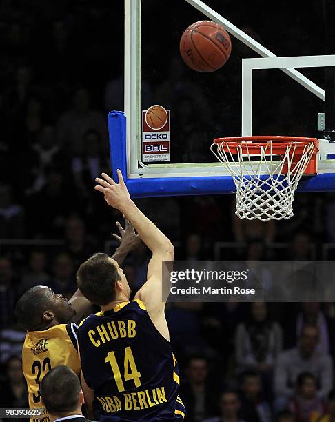 Marcus Goree of Braunschweig and Adam Chubb of Berlin compete for the ball during the Beko Basketball Bundesliga match between New Yorker Phantoms...