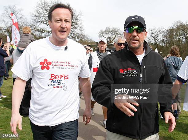 Conservative leader David Cameron, Britain's opposition party, and former cricketer Ian Botham, take part in the 'Forget Me Not Walk', on April 11,...