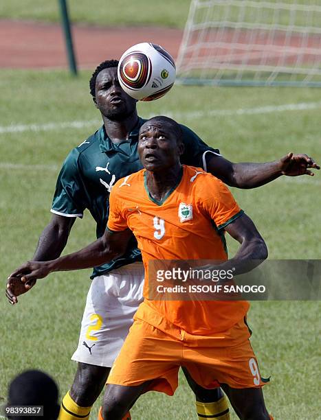 Ivory Coast's player Tiezan Ladji Kone fights for the ball with Togo's Magnima Tawali on April 11, 2010 during their African Nations Championship...