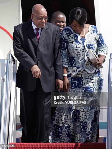 South African President Jacob Zuma and his wife Thobeka arrive at the Andrews Air Force base for the Nuclear Security Summit in Washington on April...