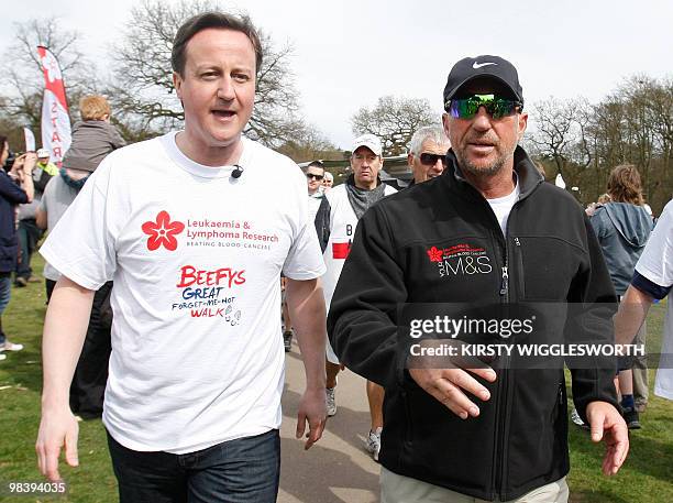 David Cameron leader of the Britain's opposition Conservative party and Ian Botham former England Cricketer chat as they take part in the 'Forget Me...