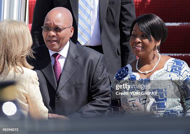 President of South Africa Jacob Zuma and his wife Thobeka arrive at the Andrews Air Force base for the Nuclear Security Summit in Washington on April...