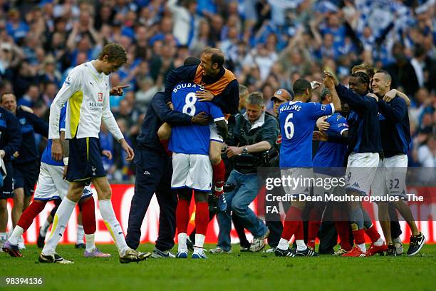 Portsmouth players celebrate victory after the FA Cup sponsored by E.ON Semi Final match between Tottenham Hotspur and Portsmouth as Peter Crouch...