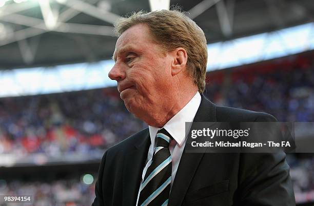 Tottenham Hotspur manager Harry Redknapp is dejected after defeat during the FA Cup sponsored by E.ON Semi Final match between Tottenham Hotspur and...