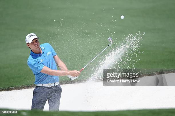 Nick Watney plays a bunker a shot on the second hole during the final round of the 2010 Masters Tournament at Augusta National Golf Club on April 11,...