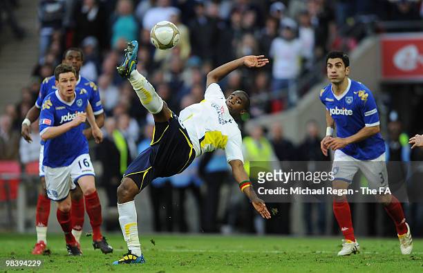 Sebastien Bassong of Tottenham Hotspur makes a clearance during the FA Cup sponsored by E.ON Semi Final match between Tottenham Hotspur and...