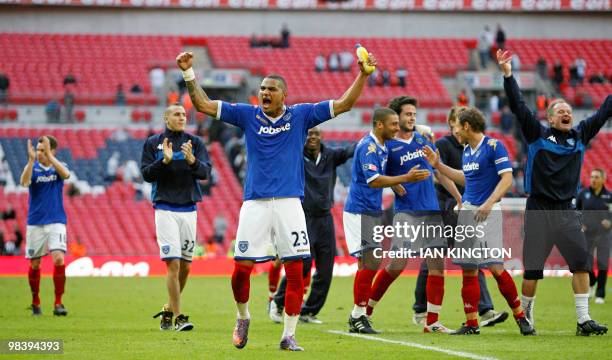 Portsmouth's Ghanaian player Kevin Prince Boateng leads the celebrations after the FA Cup semi-final football match between Tottenham Hotspur and...