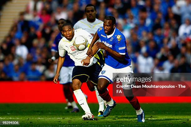 John Utaka of Portsmouth is chased by Wilson Palacios of Tottenham Hotspur during the FA Cup sponsored by E.ON Semi Final match between Tottenham...