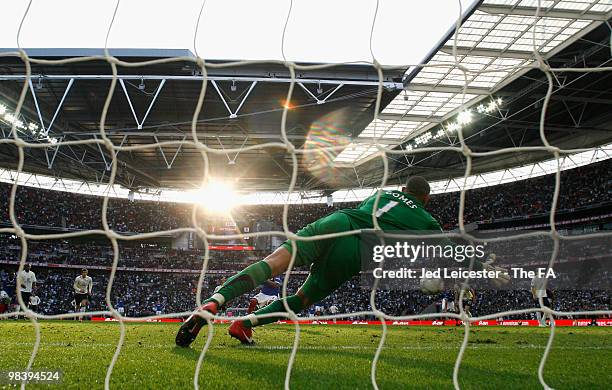 Heurelho Gomes of Tottenham Hotspur reaches for the shot during the FA Cup sponsored by E.ON Semi Final match between Tottenham Hotspur and...