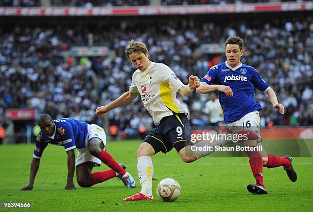 Roman Pavlyuchenko of Tottenham Hotspur is closed down byAaron Mokoena and Steve Finnan of Portsmouth during the FA Cup sponsored by E.ON Semi Final...