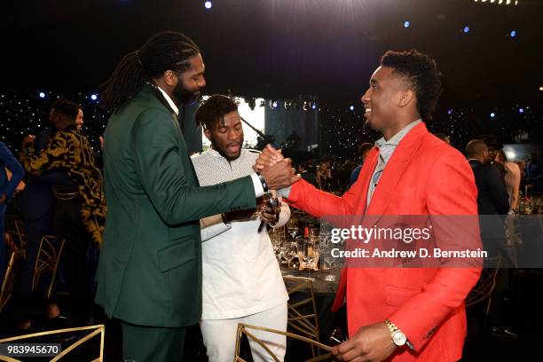 Nene Hilario of the Houston Rockets shakes hands with Donovan Mitchell of the Utah Jazz during the 2018 NBA Awards Show on June 25, 2018 at The...