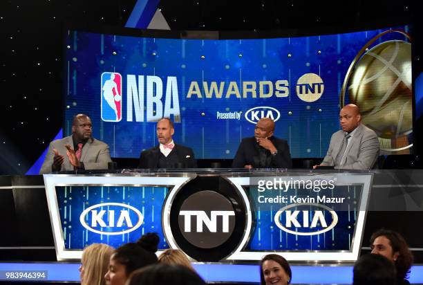 Shaquille O'Neal, Ernie Johnson Jr., Kenny Smith, and Charles Barkley speak onstage at the 2018 NBA Awards at Barkar Hangar on June 25, 2018 in Santa...