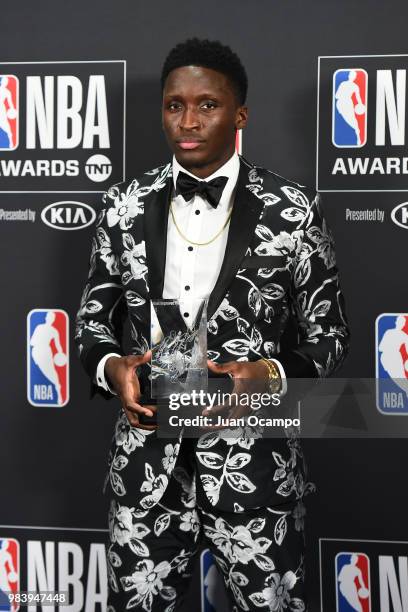 Victor Oladipo of the Indiana Pacers poses for a photograph with the award during the 2018 NBA Awards Show on June 25, 2018 at The Barkar Hangar in...