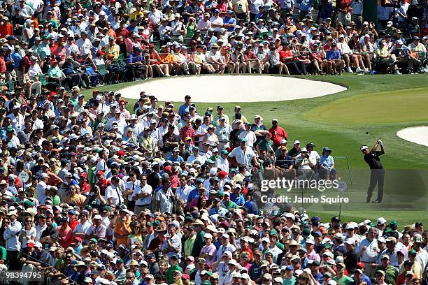 Choi of South Africa hits his tee shot on the third hole during the final round of the 2010 Masters Tournament at Augusta National Golf Club on April...