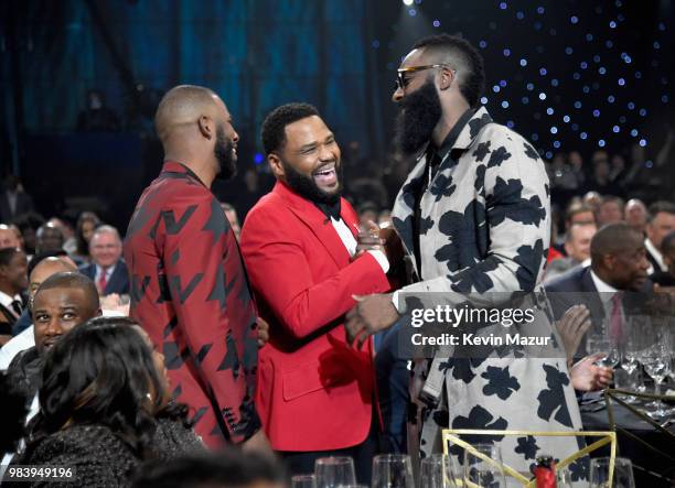 Chris Paul, host Anthony Anderson and James Harden speak in the audience at the 2018 NBA Awards at Barkar Hangar on June 25, 2018 in Santa Monica,...