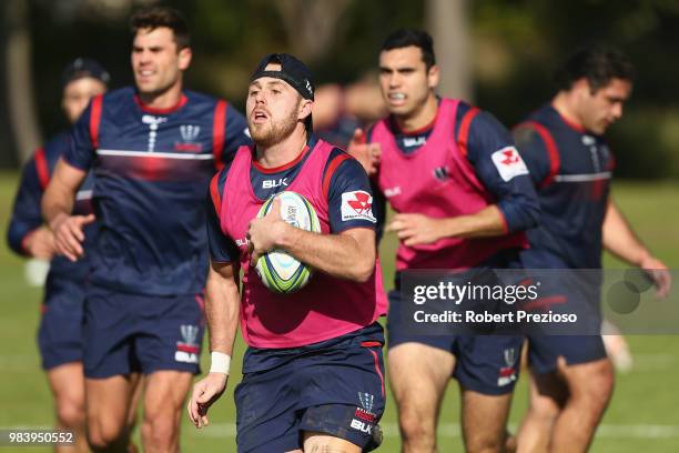 Tayler Adams runs during a Melbourne Rebels Super Rugby training session at AAMI Park on June 26, 2018 in Melbourne, Australia.