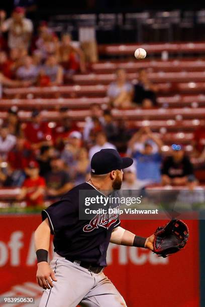 Jason Kipnis of the Cleveland Indians misplays a ground ball against the St. Louis Cardinals in the eighth inning at Busch Stadium on June 25, 2018...