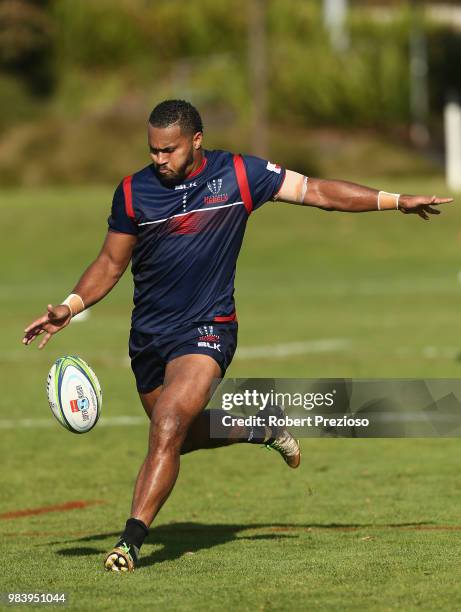 Sefanaia Naivalu kcks during a Melbourne Rebels Super Rugby training session at AAMI Park on June 26, 2018 in Melbourne, Australia.