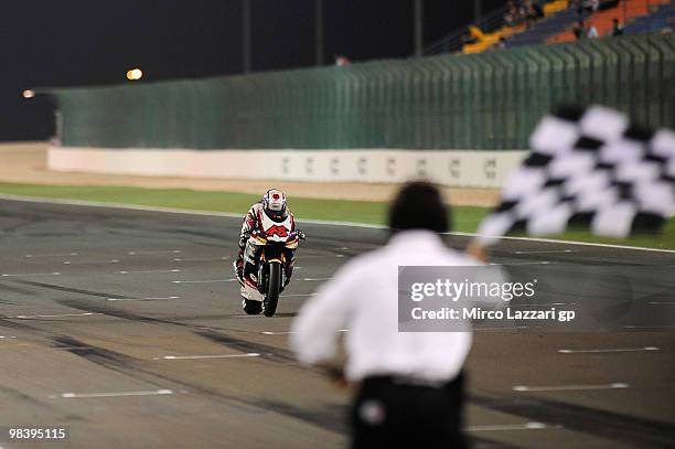 Shoya Tomizawa of Japan and Technomag - CIP cuts the finish line and celebrates the victory at the end of the Moto2 race of the Qatar Grand Prix at...