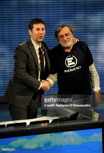 Fabio Fazio and Gino Strada attend Che Tempo Che Fa Italian TV Show held at RAI Studios on April 11, 2010 in Milan, Italy.