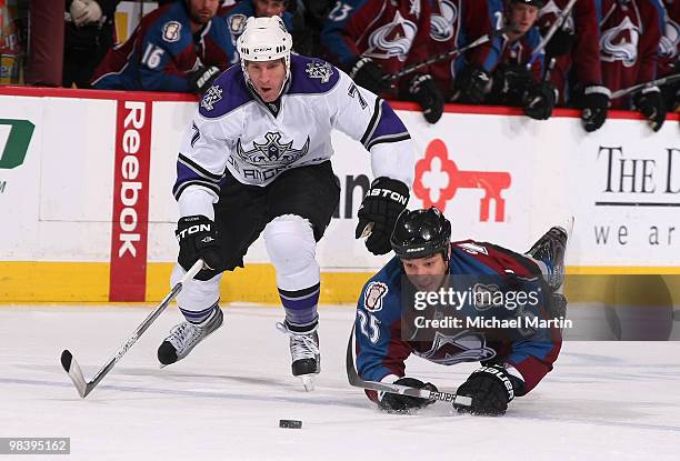 Chris Stewart of the Colorado Avalanche skates against Rob Scuderi of the Los Angeles Kings at the Pepsi Center on April 11, 2010 in Denver, Colorado.