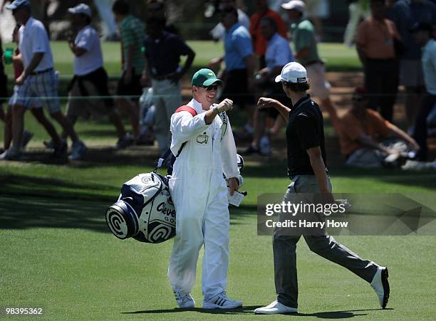 Adam Scott of Australia celebrates after an eagle on the seventh hole during the final round of the 2010 Masters Tournament at Augusta National Golf...