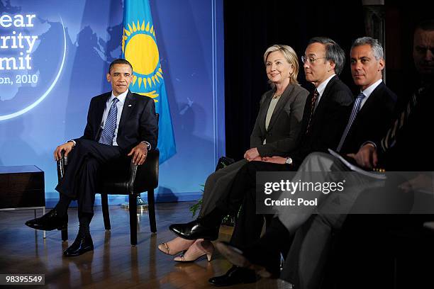 President Barack Obama, Secretary of State Hillary Clinton, Energy Secretary Steven Chu and White House Chief of Staff Rahm Emanuel look on during a...