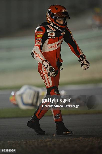 Stefan Bradl of Germany and Viessmann Kiefer Racing crashed out during the Moto2 race of the Qatar Grand Prix at Losail Circuit on April 11, 2010 in...