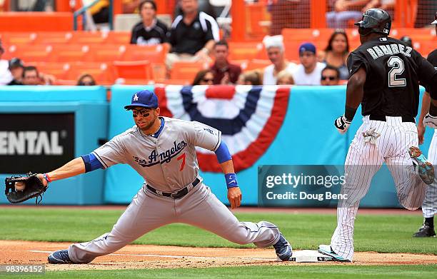 First baseman James Loney of the Los Angeles Dodgers scoops up a throw to force out shortstop Hanley Ramirez of the Florida Marlins at Sun Life...