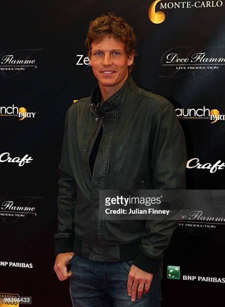 Tomas Berdych of Czech Republic poses for photos on the red carpet before the players party during previews for the ATP Masters Series Monte Carlo...