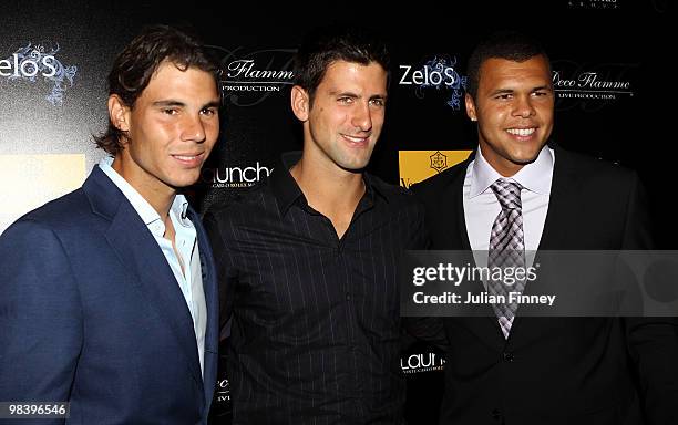 Rafael Nadal of Spain, Novak Djorkovic of Serbia and Jo Wilfried Tsonga of France pose for a photo at the players party during previews for the ATP...