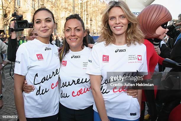 Valerie Begue, Hermine de Clermont-Tonnerre and Sylvie Tellier pose for the 'Mecenat Chirurgie Cardiaque' association before the start of the Paris...
