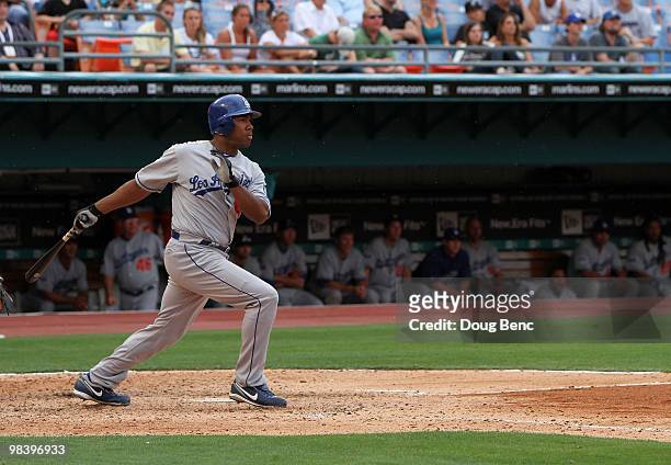 Left fielder Garret Anderson of the Los Angeles Dodgers singles in the ninth inning against the Florida Marlins at Sun Life Stadium on April 11, 2010...