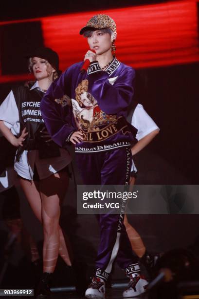 Singer Li Yuchun performs onstage during the final match of Produce 101 on June 23, 2018 in Hangzhou, Zhejiang Province of China. Girl group Rocket...