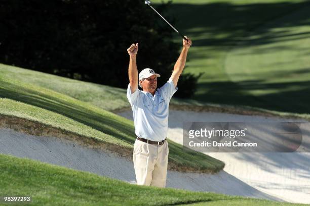 Fred Couples reacts to his shot from a bunker on the tenth hole during the final round of the 2010 Masters Tournament at Augusta National Golf Club...