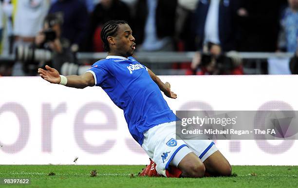 Frederic Piquionne of Portsmouth kneels celebrating his goal during the FA Cup sponsored by E.ON Semi Final match between Tottenham Hotspur and...