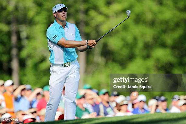 Ricky Barnes watches his tee shot on the 12th hole during the final round of the 2010 Masters Tournament at Augusta National Golf Club on April 11,...