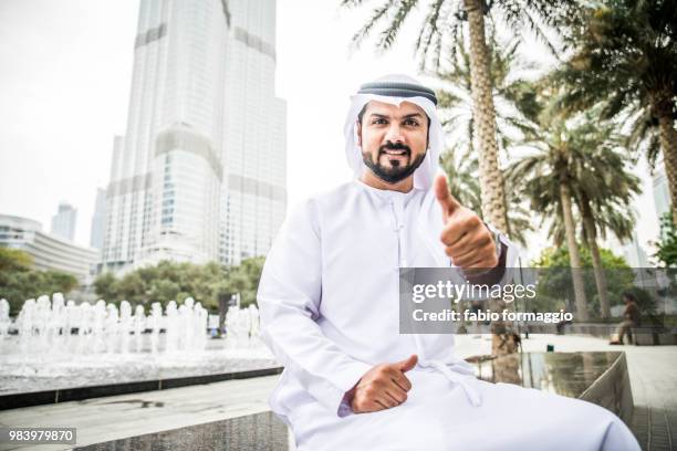 arabian man in the emirates - agal stock pictures, royalty-free photos & images